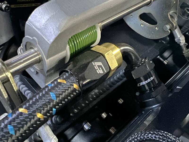 GReddy AN10 Straight Swivel Hose End - Black/Gold Anodized